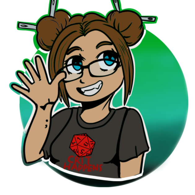 A girl with two buns in her hair, needles sticking out. Blue eyes and black glasses. A large smile. A dark grey shirt that has a red d20 on it which says "Crit Happens" below it.